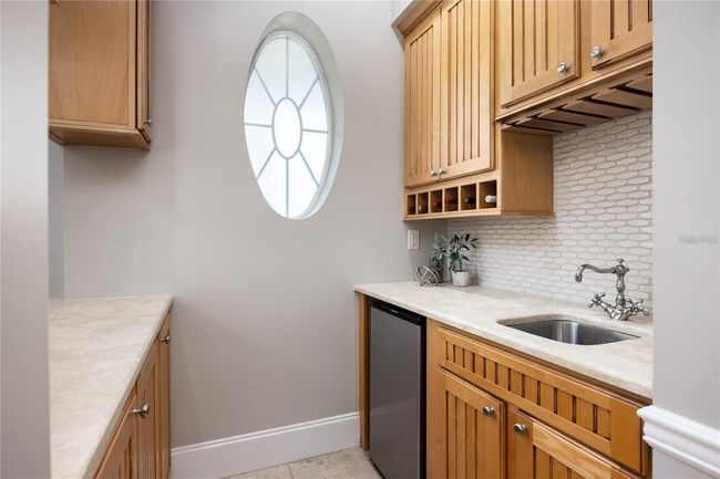 Wet Bar overlooking the dining room. | Image 13