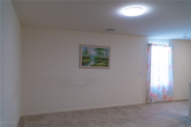 Spare room with baseboards, visible vents, and carpet | Image 48