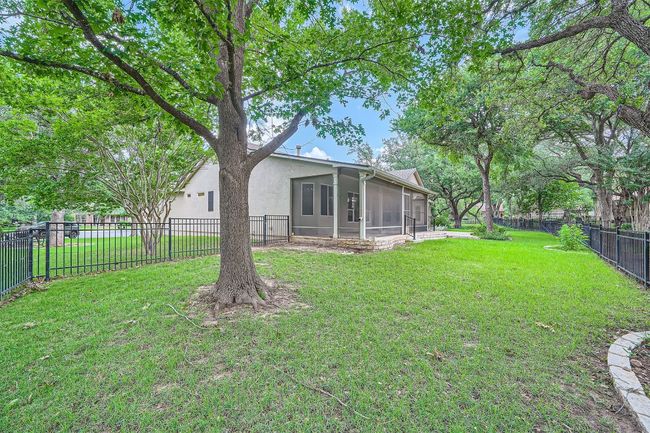 View of yard featuring a sunroom | Image 26