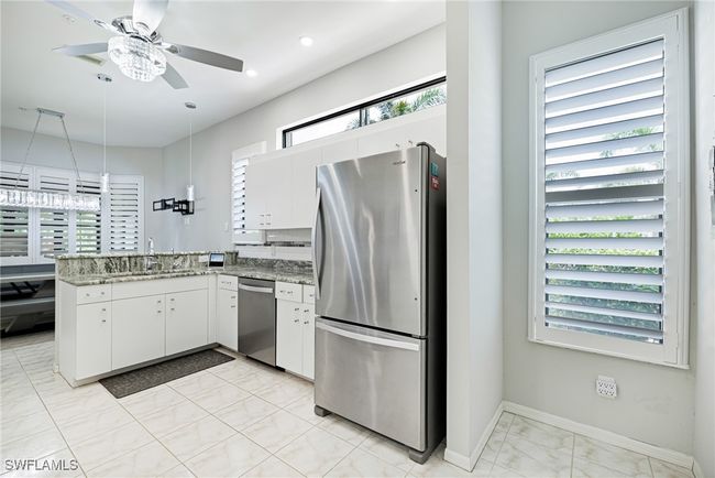 12802 Maiden Cane Ln, House attached with 3 bedrooms, 2 bathrooms and null parking in BONITA SPRINGS FL | Image 10