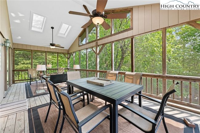 Spacious screened in porch that gives a tree house feel. | Image 21