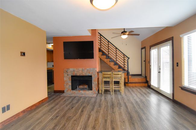 Custom designed staircase leads to a loft. | Image 6