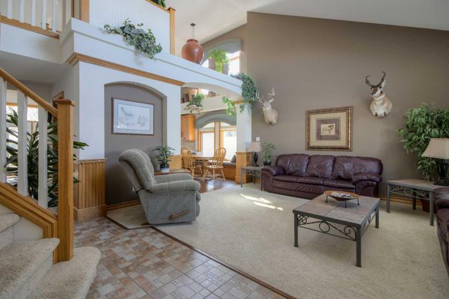 8 Canyoncrest Point W, Home with 5 bedrooms, 3 bathrooms and 5 parking in Lethbridge AB | Image 4