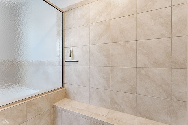 full bathroom with tiled shower | Image 30