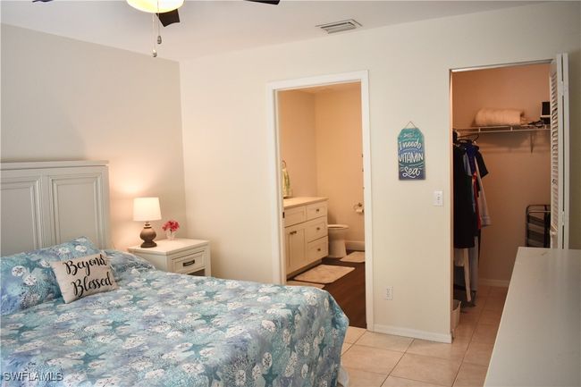 Ensuite with bathroom and large walk-in closet | Image 9