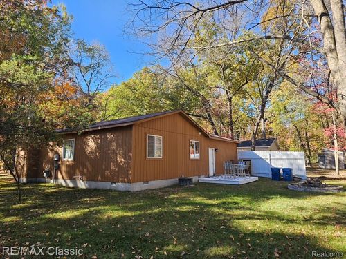 207 Butterfield Ln, Houghton Lake, MI, 48629-9162 | Card Image