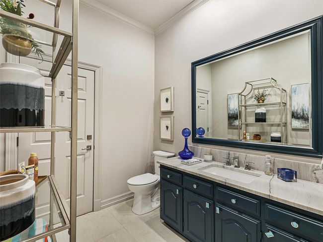 Bathroom with vanity and crown molding | Image 30