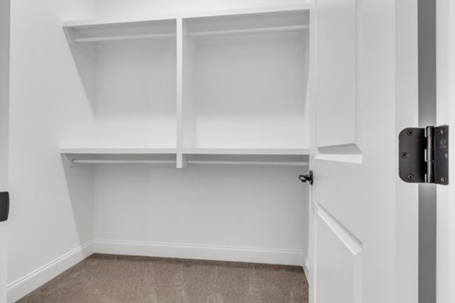Spacious walk in closet for guest bedroom. | Image 16