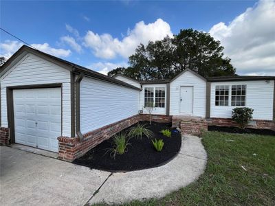 Beautifully renovated home with new fenced in backyard | Image 2