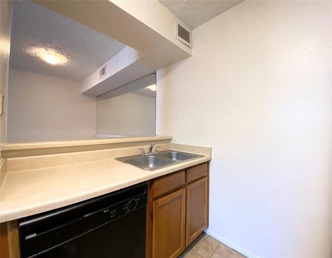 UNIT-903 - 10555 Turtlewood Ct, Townhouse with 2 bedrooms, 2 bathrooms and null parking in Houston TX | Image 13