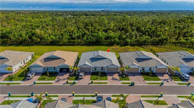 Drone / aerial view with a residential view and a view of trees | Image 4