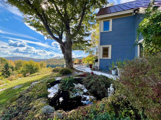 Extensive Landscaping Features Include A Pond with Bubbler | Image 13