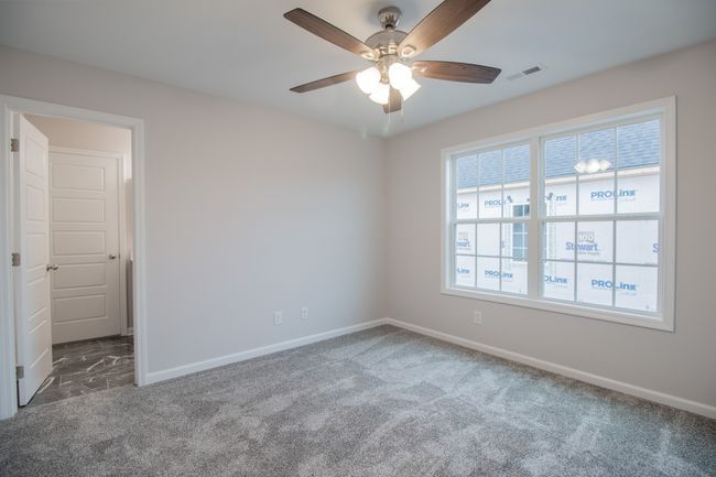 EXAMPLE>>>One of the Large Guest Bedrooms Upstairs! Both Upstairs Bedrooms have Walk-in Closets and Connected Full Bathrooms! | Image 16
