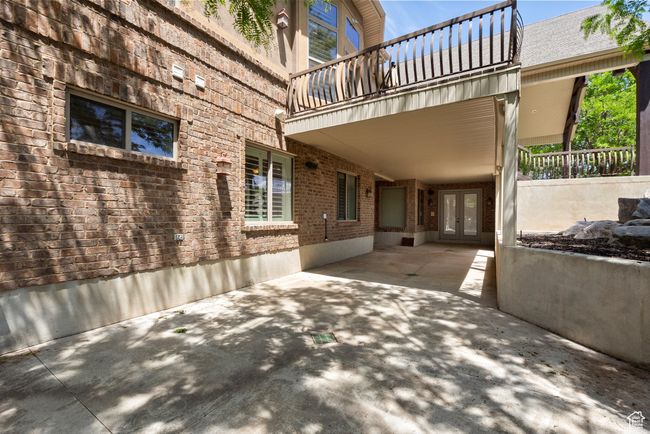 View of patio with french doors and a balcony | Image 74