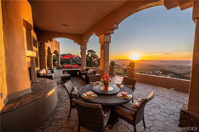 Patio terrace at dusk with outdoor lounge area and a patio | Image 25
