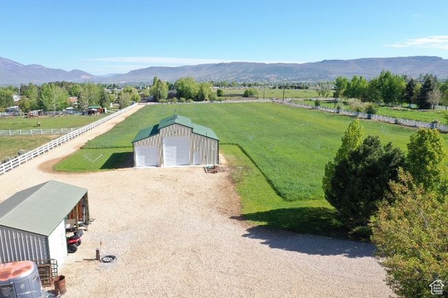 Overview of rural landscape with a mountain backdrop | Image 35