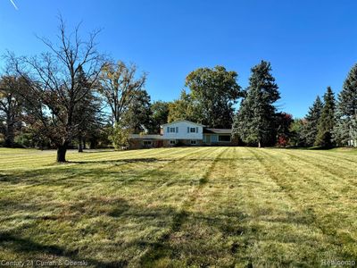 25115 Martindale Road, Home with 4 bedrooms, 2 bathrooms and null parking in South Lyon MI | Image 1