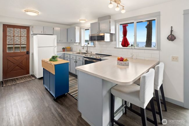 Kitchen with water views | Image 6