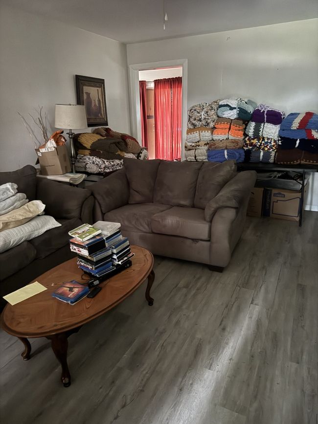 Living area featuring wood finished floors | Image 5