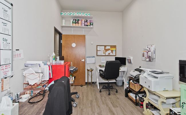 Office space featuring wood finished floors | Image 17