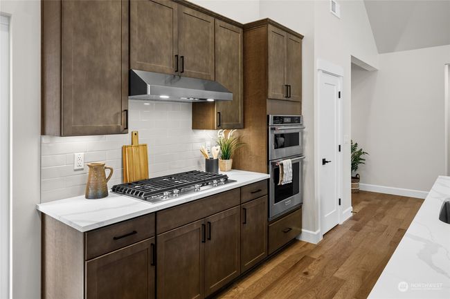Kitchen with plenty of storage | Image 13