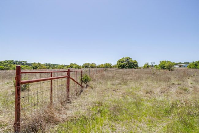 View of yard with fence and a rural view | Image 14