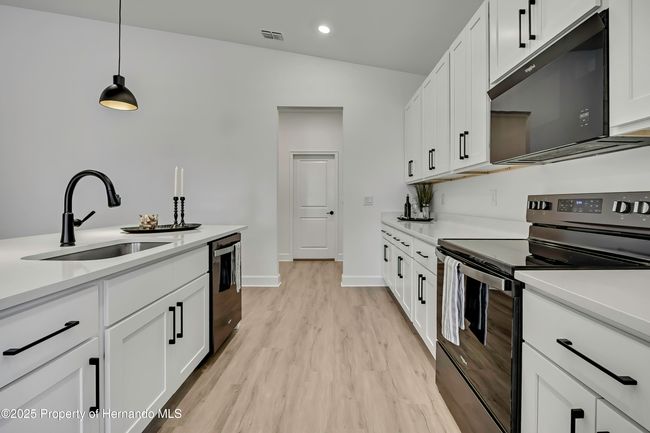 9739 Loretto St, House other with 4 bedrooms, 3 bathrooms and null parking in SPRING HILL FL | Image 11