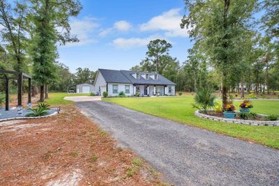 115 Calusa Way, House other with 4 bedrooms, 2 bathrooms and null parking in CRAWFORDVILLE FL | Image 1