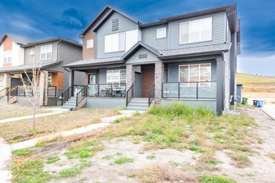 275 Wolf Creek Way Se, Home with 5 bedrooms, 3 bathrooms and 2 parking in Calgary AB | Image 1