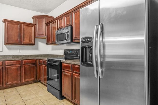 3492 Newtons Crest Cir, House other with 4 bedrooms, 3 bathrooms and null parking in Snellville GA | Image 11
