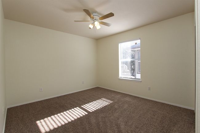 Spare room with carpet and ceiling fan | Image 19