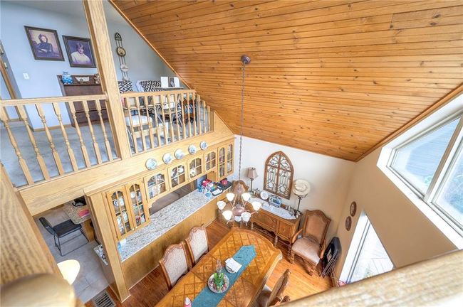 Living room featuring wood ceiling and vaulted ceiling | Image 26