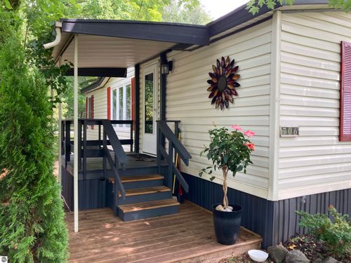 706 Golfview Cir, Elk Rapids, MI, 49629-9781 | Card Image