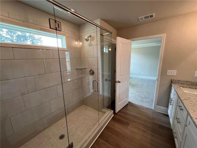 11 Creekside Commons Dr, Townhouse with 3 bedrooms, 3 bathrooms and null parking in Hoschton GA | Image 37