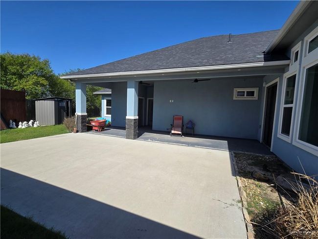 View of patio / terrace featuring ceiling fan | Image 21