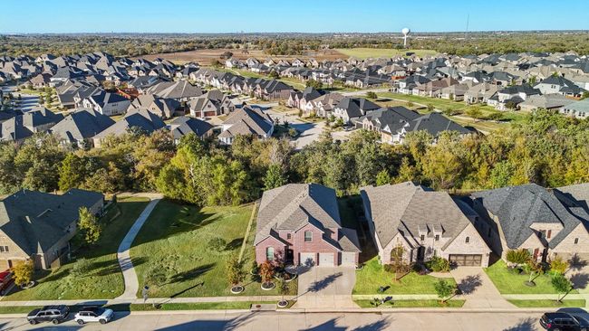 Aerial view of property's location featuring nearby suburban area | Image 32