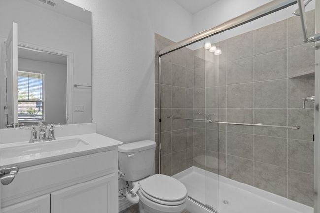 Full bathroom featuring vanity and a shower stall | Image 14