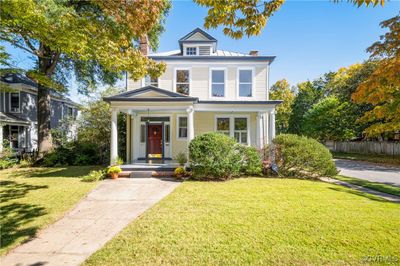 View of front of property featuring a front yard and covered porch | Image 2