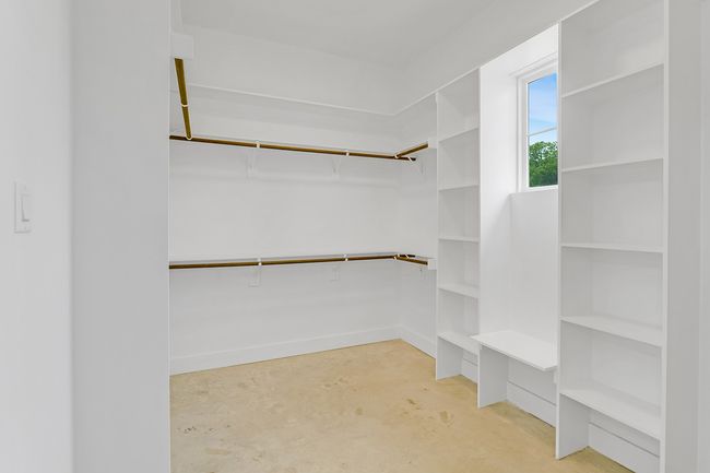 View of walk in closet | Image 24