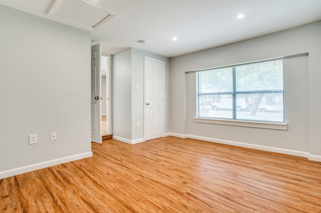 Primary master bedroom is split from the other 2-bedrooms and has a private ensuite bathroom. | Image 6