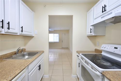 36-c-10016 Twin Lakes Dr, Coral Springs, FL, 33071-5342 | Card Image