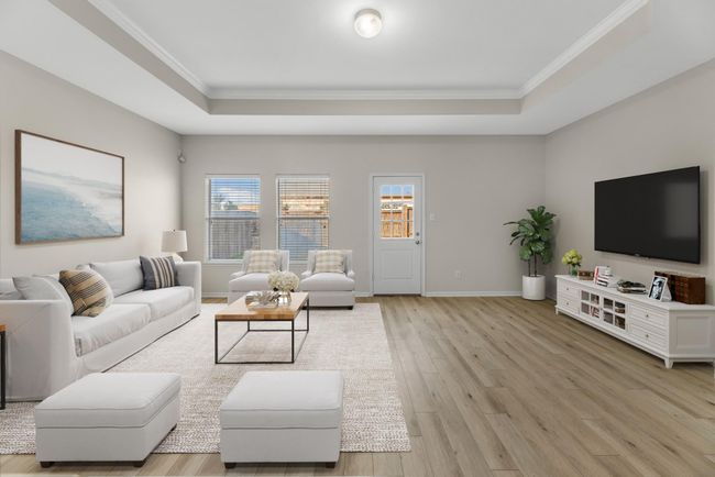 Your family room has ample space to entertain family and friends. Virtually staged to show furniture placement. | Image 13