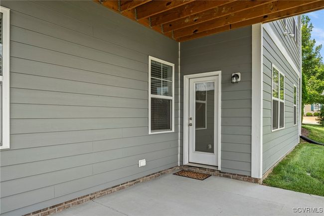 View of exterior entry featuring a patio area | Image 44