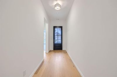 Entryway with light hardwood / wood-style floors | Image 3