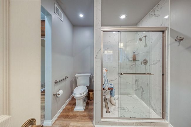 Ensuite bathroom to first floor master has separate entrance and can also serve as a guest powder room. | Image 18
