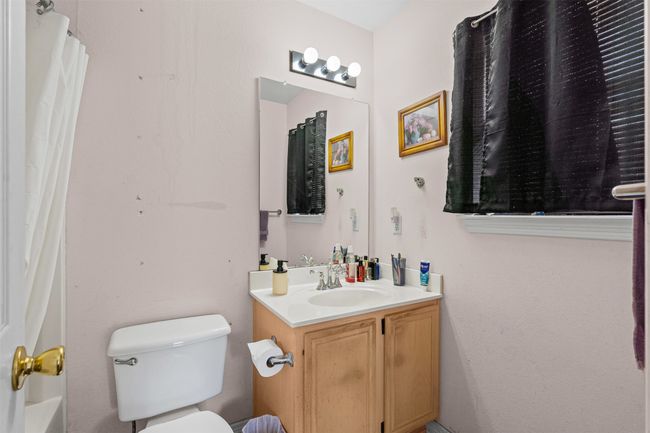 Bathroom with vanity and toilet | Image 15