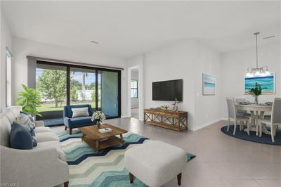 Virtually staged photo of the main living area off of the kitchen and dining area. | Image 3