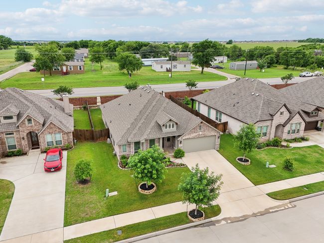 Aerial view of residential area. Big long driveway and lot size is 65'x120'. | Image 38