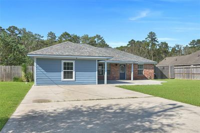 Double wide driveway with expanded front porch | Image 2