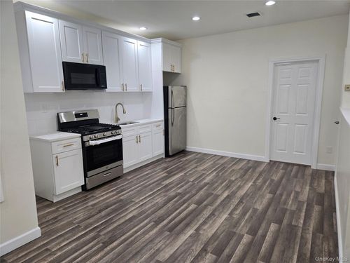 10750 Van Wyck Expy, South Richmond Hill, NY, 11419-3232 | Card Image